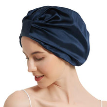 Load image into Gallery viewer, Navy mulberry silk hair turban worn as a silk hair wrap, designed to keep hair securely in place