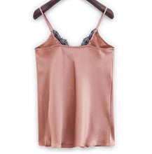 Load image into Gallery viewer, Pink satin camisole with lace trim on a wooden hanger against a white background
