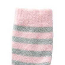Load image into Gallery viewer, Close-up of the fluffy outer texture of bed socks with 100% pure silk lining inside, showing the thick, soft fabric designed to keep feet warm indoors.
